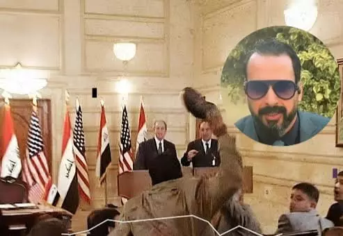 الصحفي العراقي "منتظر الزيدي" الذي صوب حذاءه في وجه بوش الأب